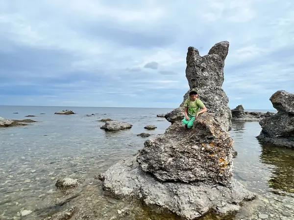 Climbing a rauk in Gotland
